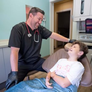 Dr. Mike with Young Male Patient